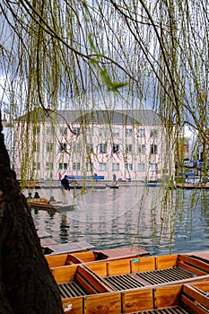 River Cam in Cambridge, England with moored punts at the shore