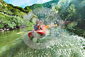 In river canoe splashes