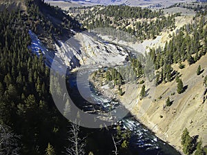 a river in a canyon in the mountains