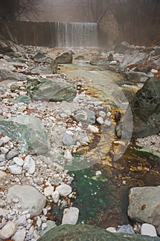 River with colored stones and hot springs in Loutra Pozar, North photo