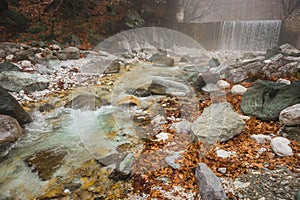 River with colored stones and hot springs in Loutra Pozar, North photo