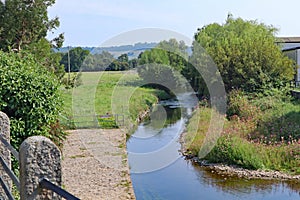 The river Coly flows slowly out of Colyton, Devon southwards towards Colyford and on to join the river Axe where it reaches the