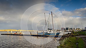 River Coquet flows by Warkworth Harbour