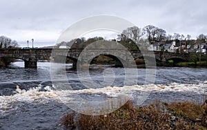 The River Cree and Caul Weir at Creebridge in Newton Stewart, Scotland photo