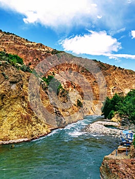 River with crystal clear waters in the Andes mountain range, south of Chile, San Clemente