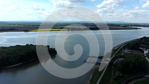 River Dam Kralova on river Vah with island, aerial turnaround view