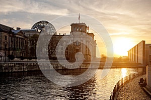 River embankment near the Bundestag - the building of the German parliament in Berlin