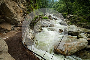 River flowing ( Barati Nala ) alongside Shrikhand Mahadev kailash Yatra . Himachal Pradesh