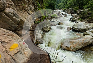 River flowing ( Barati Nala ) alongside Shrikhand Mahadev kailash Yatra . Himachal Pradesh