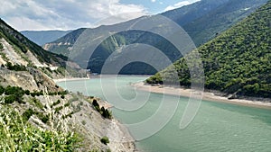 River flowing in green valley