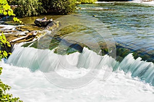 River Flowing over Rocky Ledge