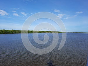 The river flows into the city of Merauke, Papua