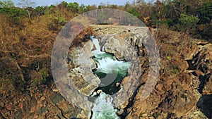 A river flows into the Khone Falls on the Mekong