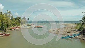 The river flows into the sea. The beautiful nature of the Philippines.