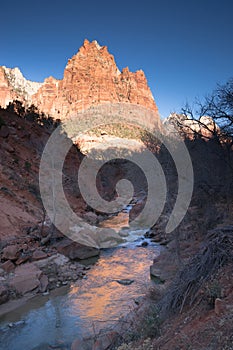 River Flows Sunrise Glow Rocky Butte Zion National Park