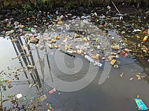 river in front of the house.  which has been contaminated with waste.  Cisarua, West Bandung.  August 22, 2023