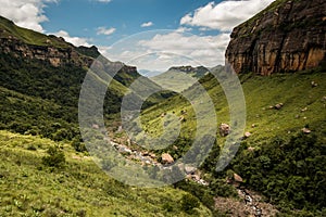 The river gorge, cliffs and mountain sides on the Thukela hike to the bottom of the Amphitheatre`s Tugela Falls