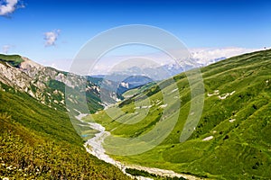 River between green hills, summer landscape