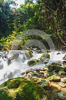 A river headwaters flows over rocks