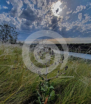 River, hills, sun over river and mountains, landscape, nature and ecology, telephony