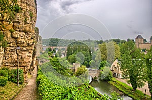 River with houses and bridges in Luxembourg in Benelux, HDR