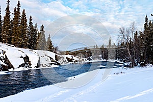 river icing over under bridge