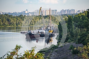 River industrial transport, tugboat crane, on the roadstead
