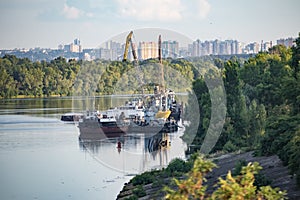 River industrial transport, tugboat crane, on the roadstead