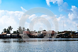 River in kampot cambodia with houses