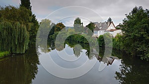 House on the banks of River La Cere Bretenoux France photo