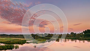 River Landscape In Belarus Or European Part Of Russia In Sunset