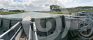 River locks and weir to regulate water flow in canal system