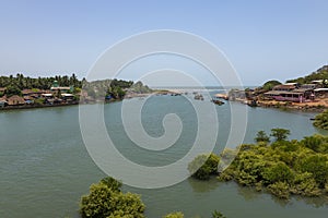 River meeting sea near Kelshi in Raigad district,maharashtra,India photo