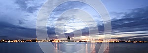 River Mersey and Birkenhead by night - panoramic view from Keel Wharf waterfront in Liverpool, UK