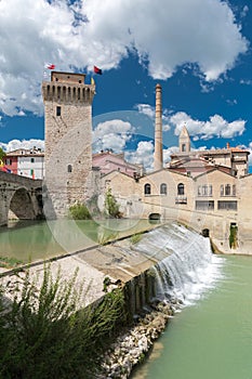 The river Metauro and the tower of Fermignano Pesaro-Urbino, Marche, Italy