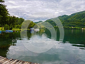 River in the middle of forested mountains under a cloudy sky in Banja Luka.Herzegovina