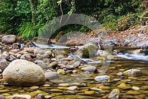 River Miera, wet stones at it. Liérganes, Cantabria, Spain