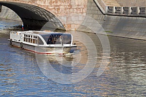 River motor ship on Moscow-river near cathedral of Christ the Sa