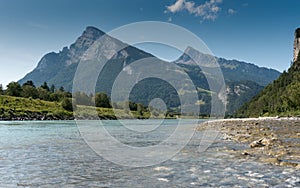 River and mountain landscape with a great view in high summer