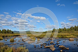 River in the mountains of Siberia in the fall