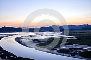 River and the mountains at the Sunchoenman Bay Wetland Reserve, South Korea at dusk