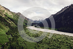 River and mountains with white clouds