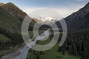 River and mountains with white clouds