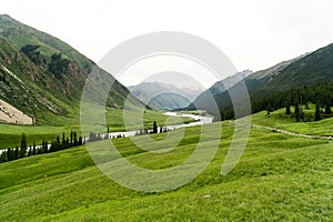 River and mountains with white clouds