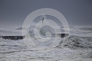 River mouth beacon under heavy storm