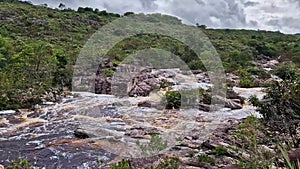 The river Mucugezinho in Chapada Diamantina, Bahia, Brazil with running water, forming a waterfall and Poco do Pato