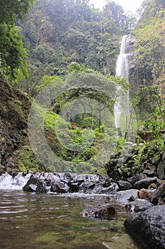 River natural in the waterfall curug cimahi bandung - indonesia photo