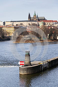 River navigation sign on Vltava with Hradcany castle, Prague, Bohemia