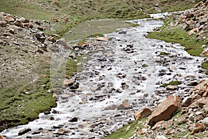 River near the Khardung Pass, Ladakh, India photo