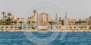 River Nile and the Egyptian temple, view from a boat, Luxor, Egypt